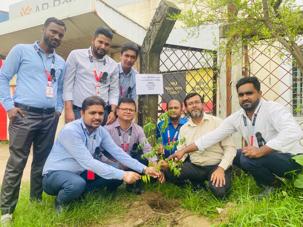 AB Bank Ltd Kalampur branch is planting trees on the occasion of National Mourning Day along with other officials of the branch manager Ashfaq Ahmed.