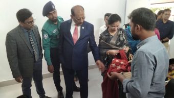 Social welfare secretary visiting children’s families