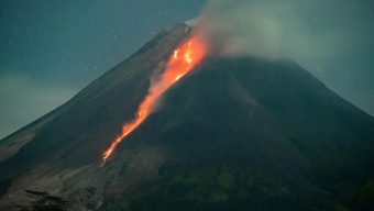 Volcano erupts in eastern Indonesia, spews miles-high ash tower