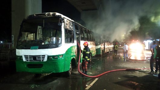 Two buses torched in Press Club area