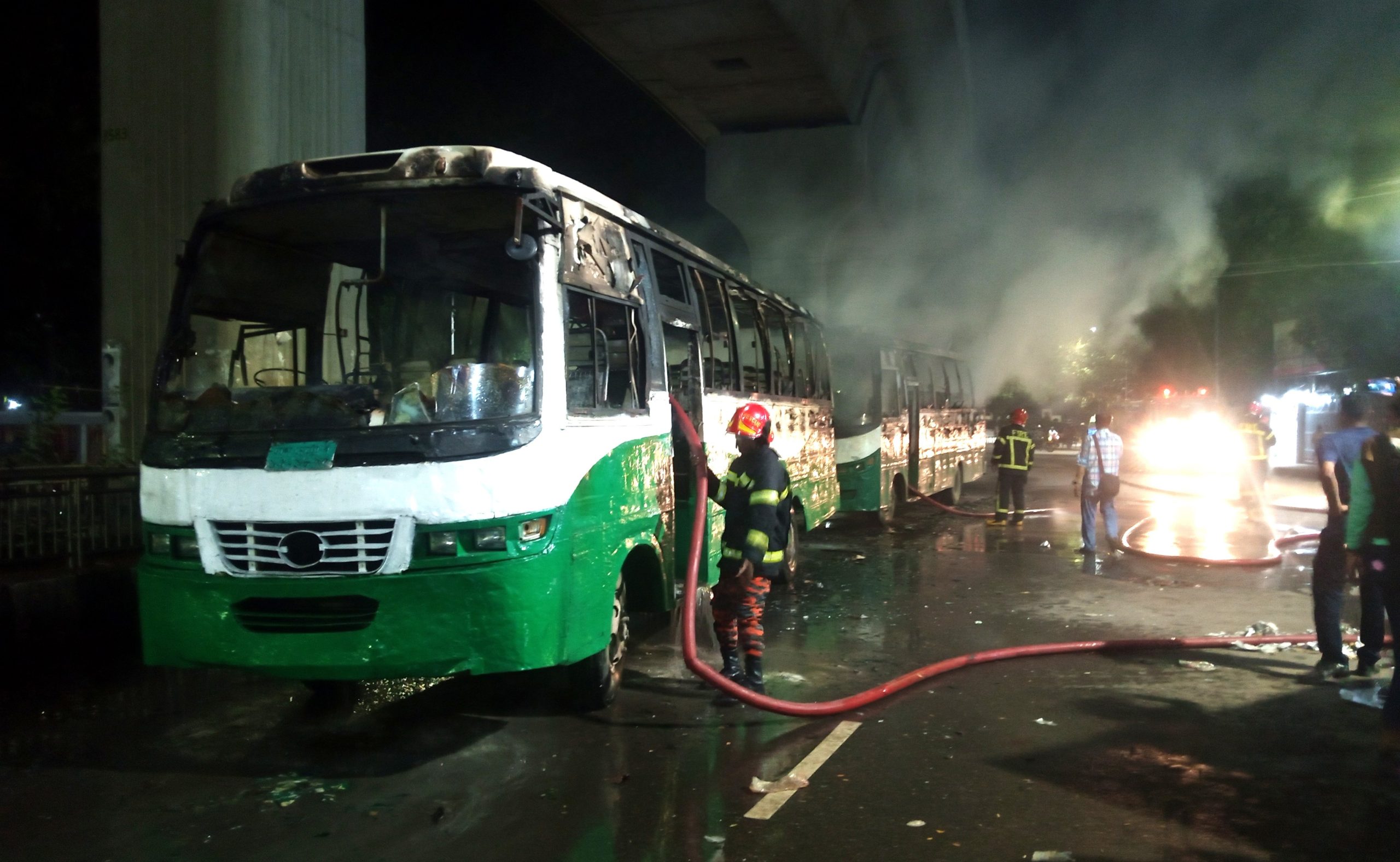 Two buses torched in Press Club area