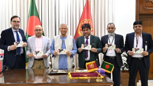 Prof Yunus releases commemorative postage stamp on Victory Day