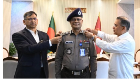 Prime Minister adorns new IGP Ali Hossain with rank badge