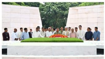 Prime Minister visits parents’ graves, offers prayer